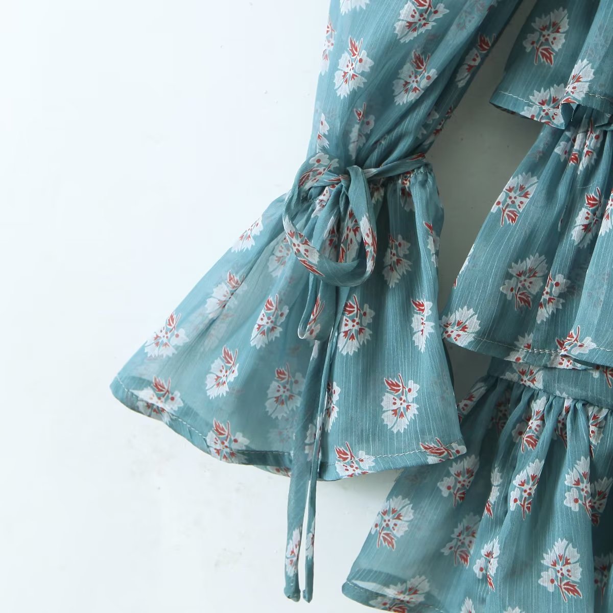 Elegant Maryangel Rebel slim fit floral chiffon dress with square collar and puff sleeves, featuring a tiered layered design.