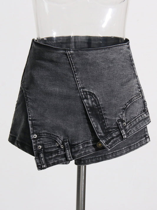 High-waist denim stitching shorts by Maryangel Rebel with an irregular asymmetric design and a washed, worn look.