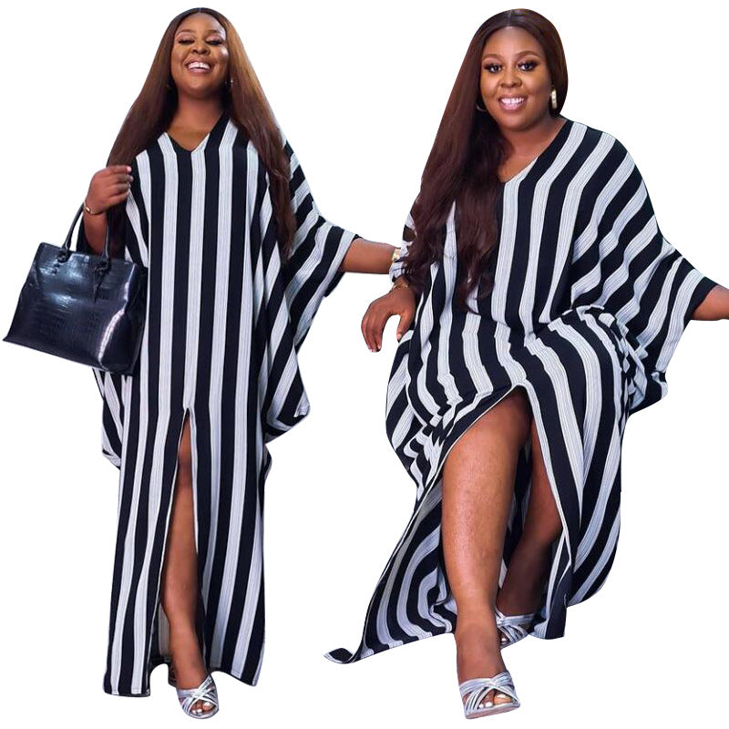 Plus size Maryangel Rebel striped asymmetric dress with a loose fit, showcasing a stylish irregular hemline.