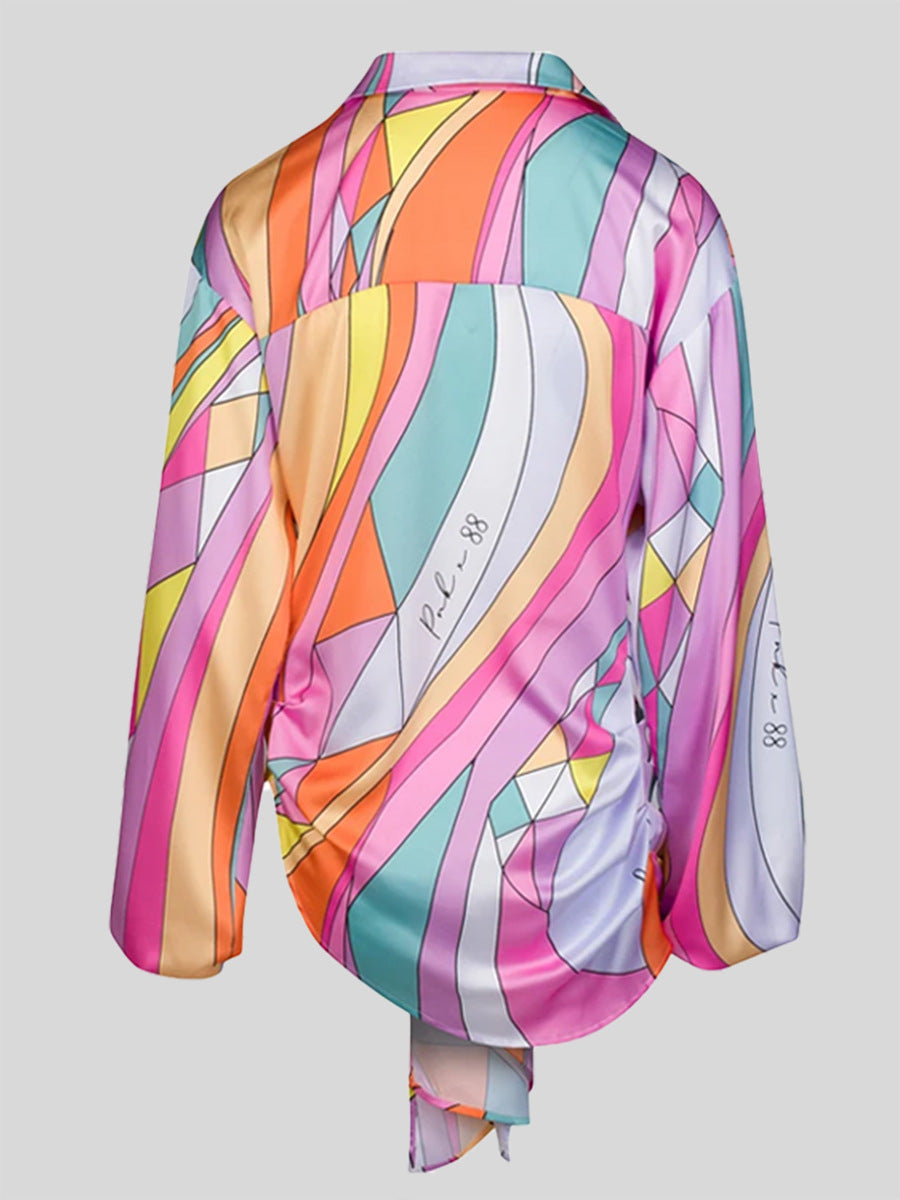 Plus size loose long sleeve printed shirt top by Maryangel Rebel in a vibrant floral design.