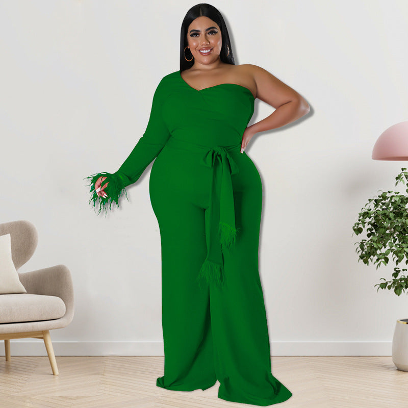 Plus size asymmetric jumpsuit in black by Maryangel Rebel, featuring a stylish design and comfortable fit for women.
