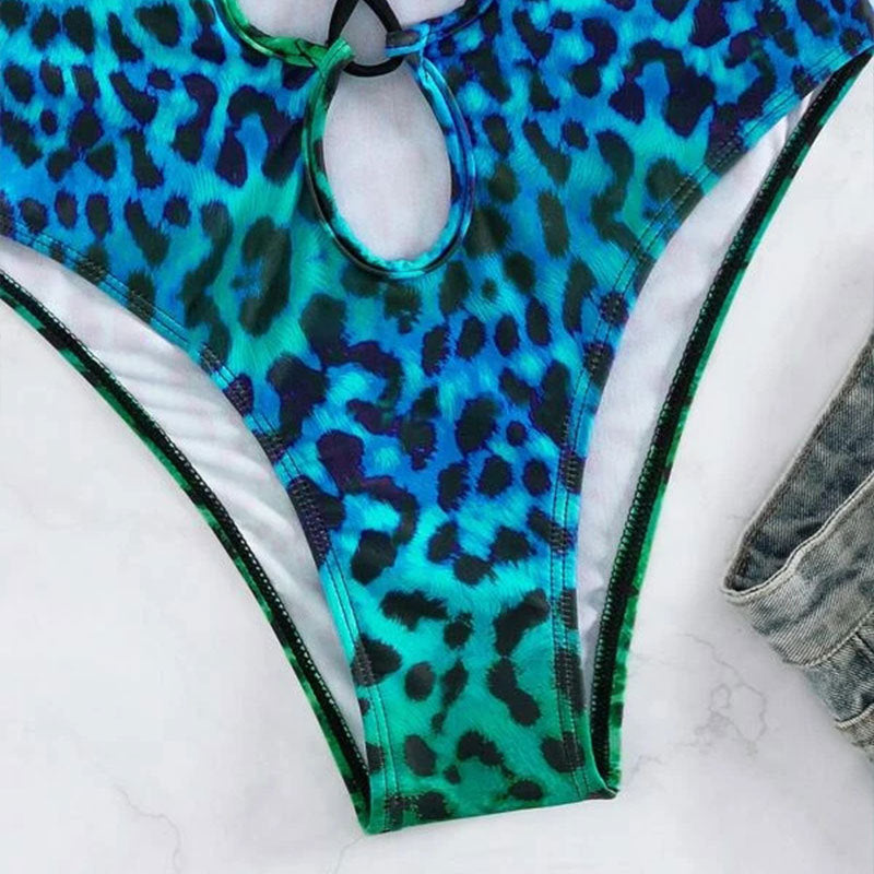Hollow out cutout strap sexy swimsuit by Maryangel Rebel, featuring a stylish design perfect for spring beachwear.