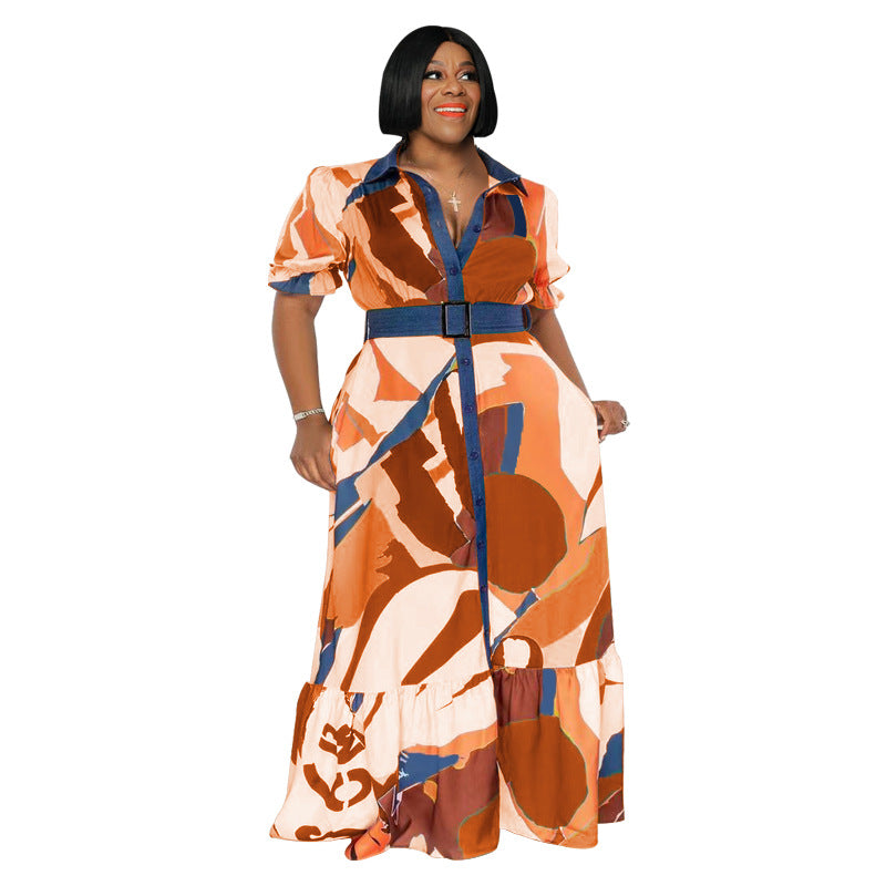 Plus size Maryangel Rebel summer dress in vibrant color print, featuring a loose fit and a stylish belt detail.