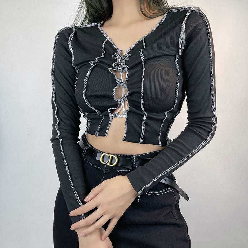 Maryangel Rebel cropped long sleeve t-shirt in black with round neck and trendy strap detailing.