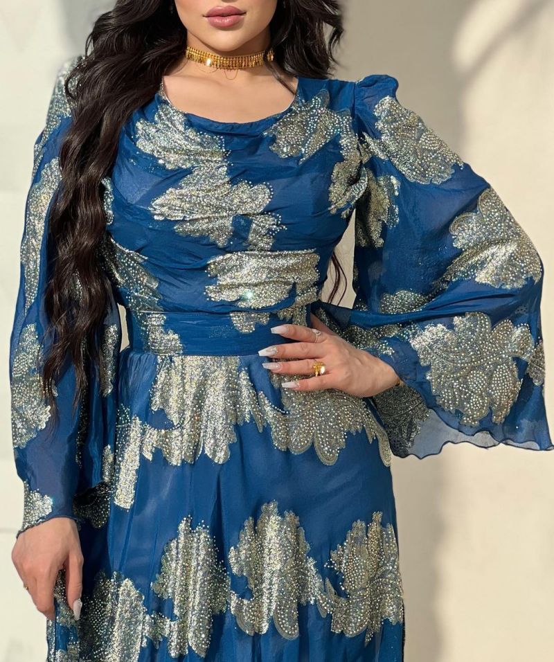 Women’s bronze printed chiffon ball gown dress by Maryangel Rebel, featuring a flowing silhouette and elegant design.