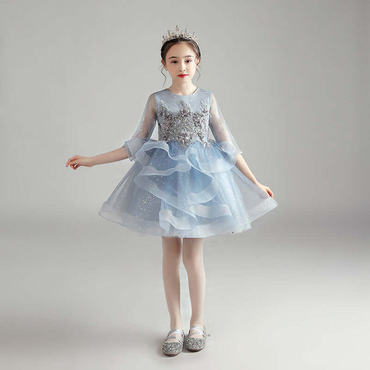 Children Dress Princess Dress Girl Girl Host Evening Dress in blue with sparkly details and a tiara.