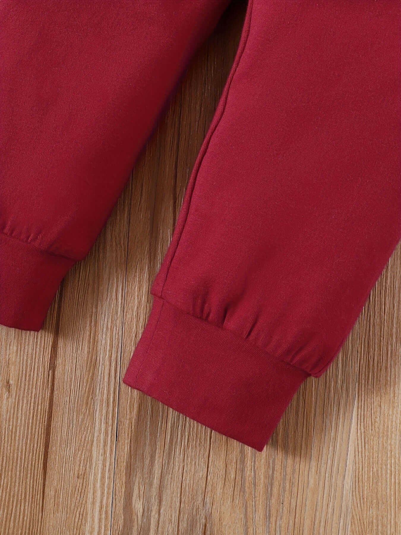 Letter Print Long Sleeve Boy Suit red pants cuff detail on wooden background