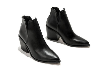 Leopard print high heel Martin boots for women by Maryangel Rebel, featuring a chunky heel and pointed ankle design.