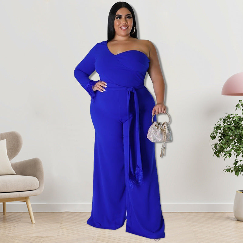 Plus size women's asymmetric jumpsuit in black by Maryangel Rebel, featuring a stylish and modern design.