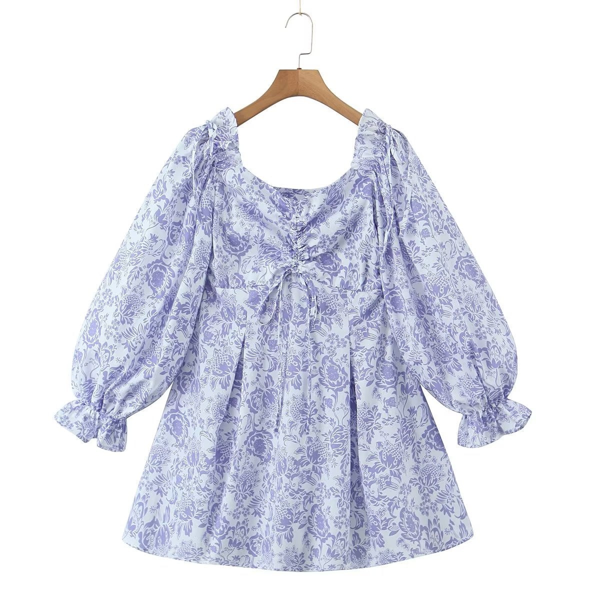 Large Maryangel Rebel swing dress featuring a spring floral pattern and a cinched waist design.