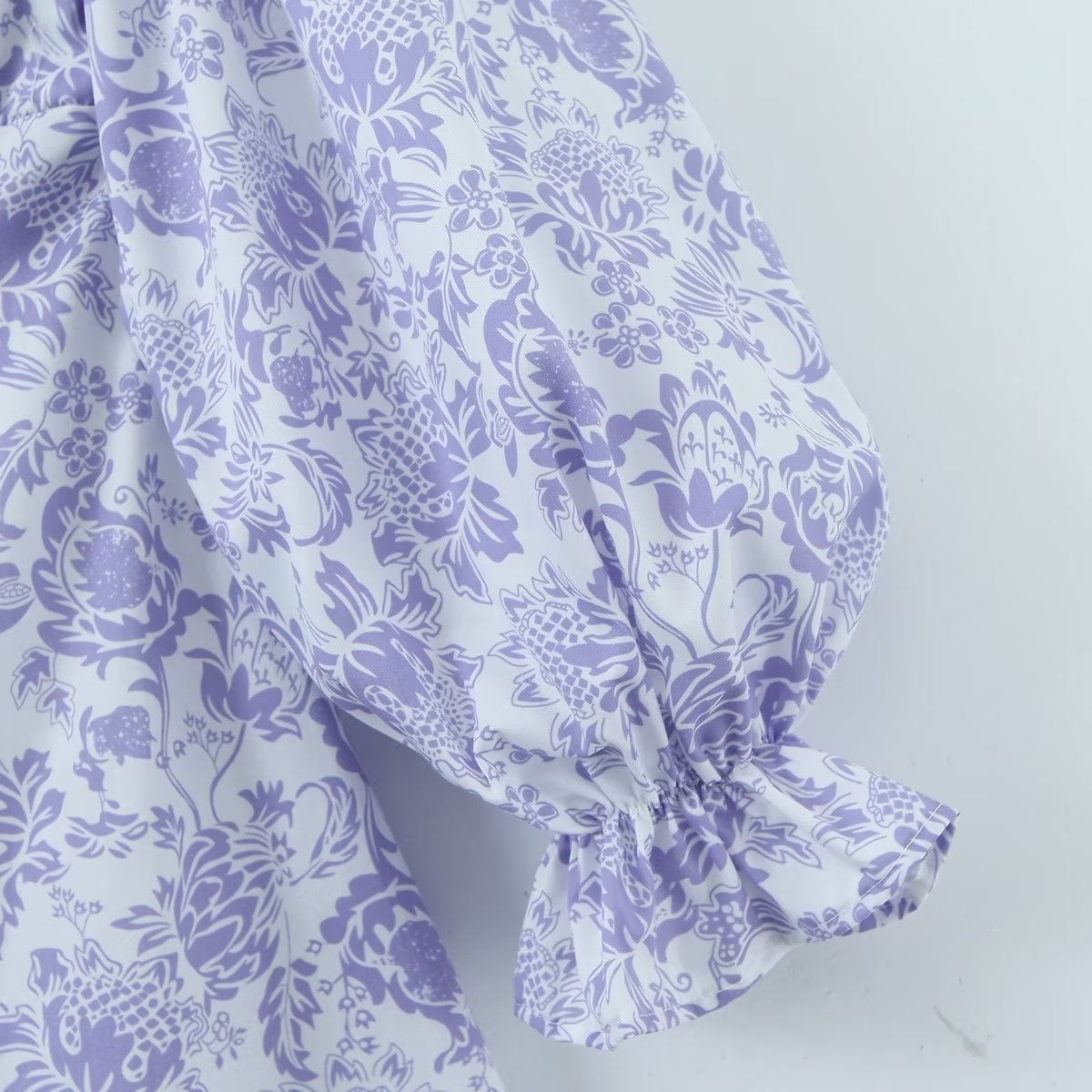 Large swing dress by Maryangel Rebel featuring a spring floral pattern and a flattering waist seal design.