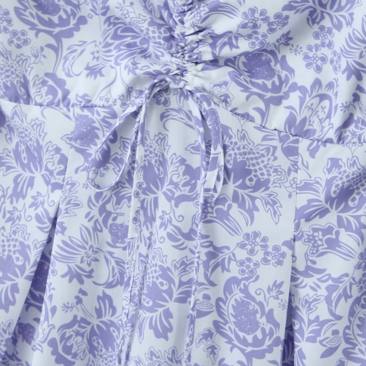 Maryangel Rebel large swing dress featuring a spring floral design and a waist seal detail, displayed on a mannequin.