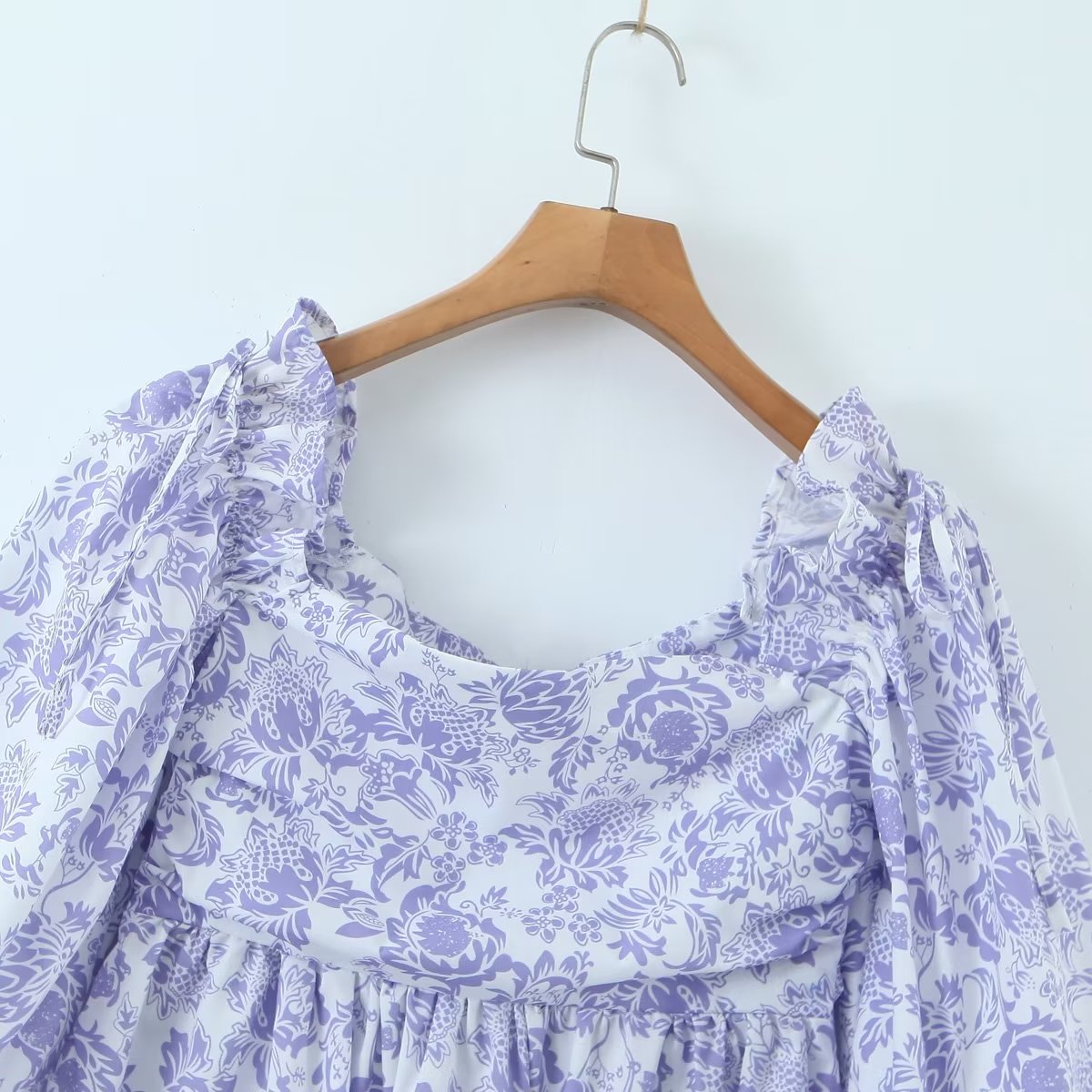 Maryangel Rebel large swing dress featuring a spring floral pattern and a flattering waist seal design.