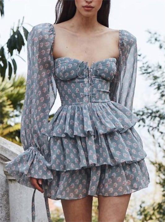 Elegant Maryangel Rebel floral chiffon dress with slim fit, square collar, and puff sleeves in a tiered design.