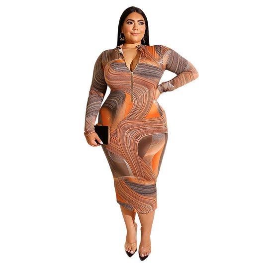 Plus size printed skinny sheath dress by Maryangel Rebel with a zipper front, showcasing a flattering fit and stylish design.