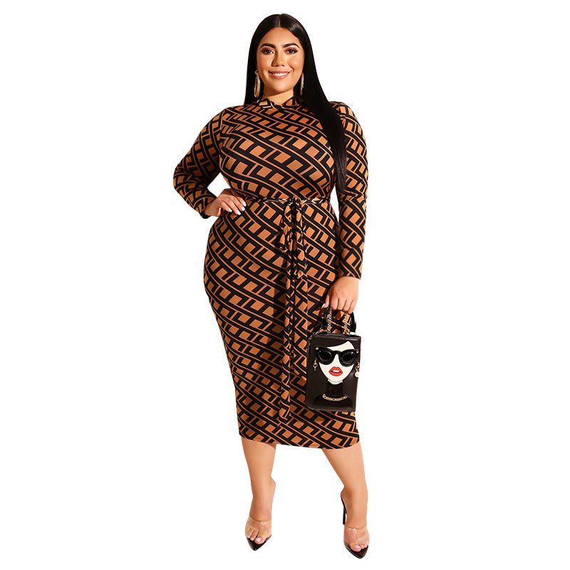 Plus size printed skinny sheath dress by Maryangel Rebel with a zipper front and back detail, showcasing a stylish fit.