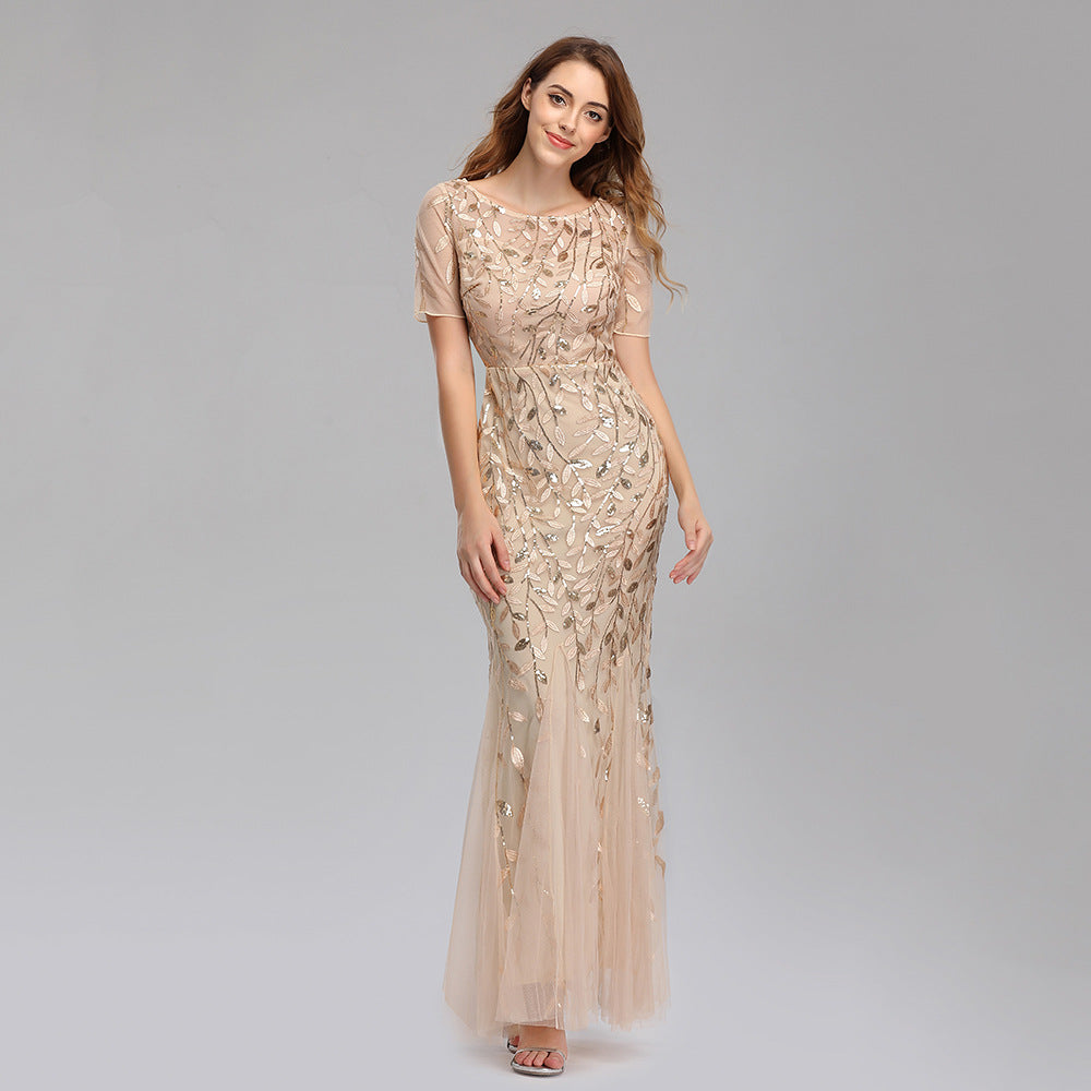 Plus size Maryangel Rebel evening dress featuring sequin mesh and a fishtail design for a slim fit, perfect for formal occasions.
