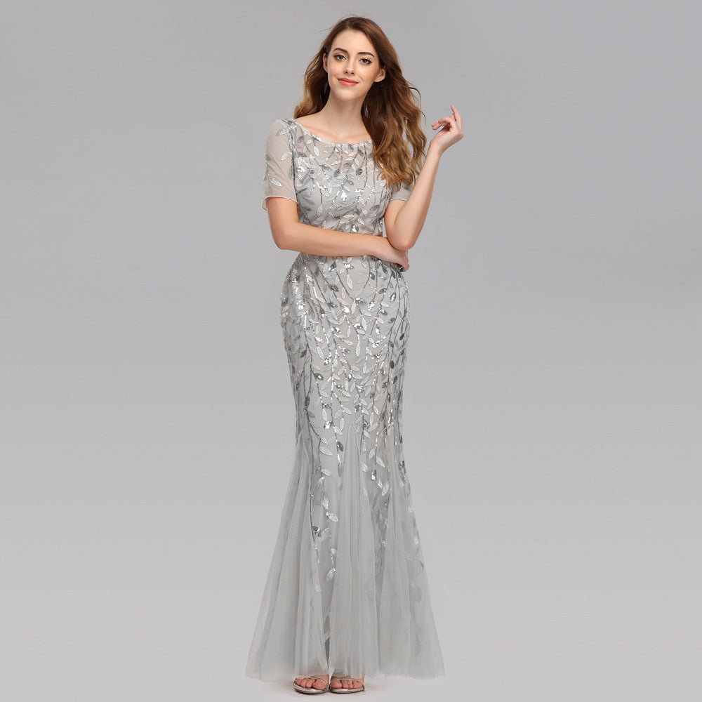Plus size Maryangel Rebel evening dress with sequin mesh, fishtail design, showcasing a slim fit and sexy style.
