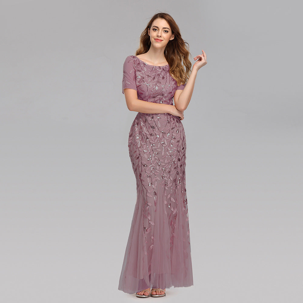 Plus size Maryangel Rebel evening dress with sequin mesh, fishtail design, and slim fit for a sexy look.