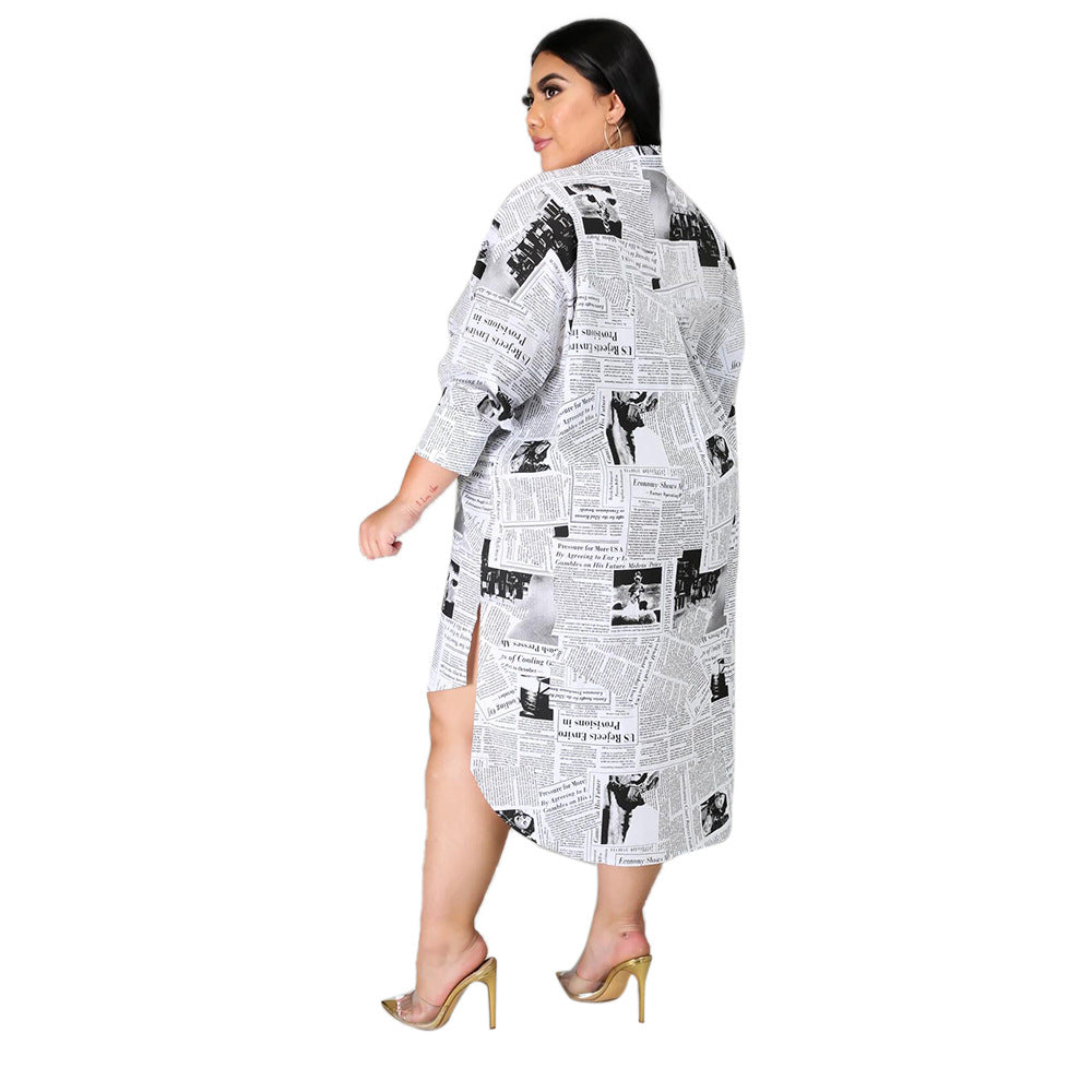 Plus size Maryangel Rebel women's shirt dress featuring a collared design with newspaper printing and an asymmetric hem.