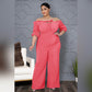 Combinaison à jambes larges et à bretelles de couleur unie de grande taille pour femmes