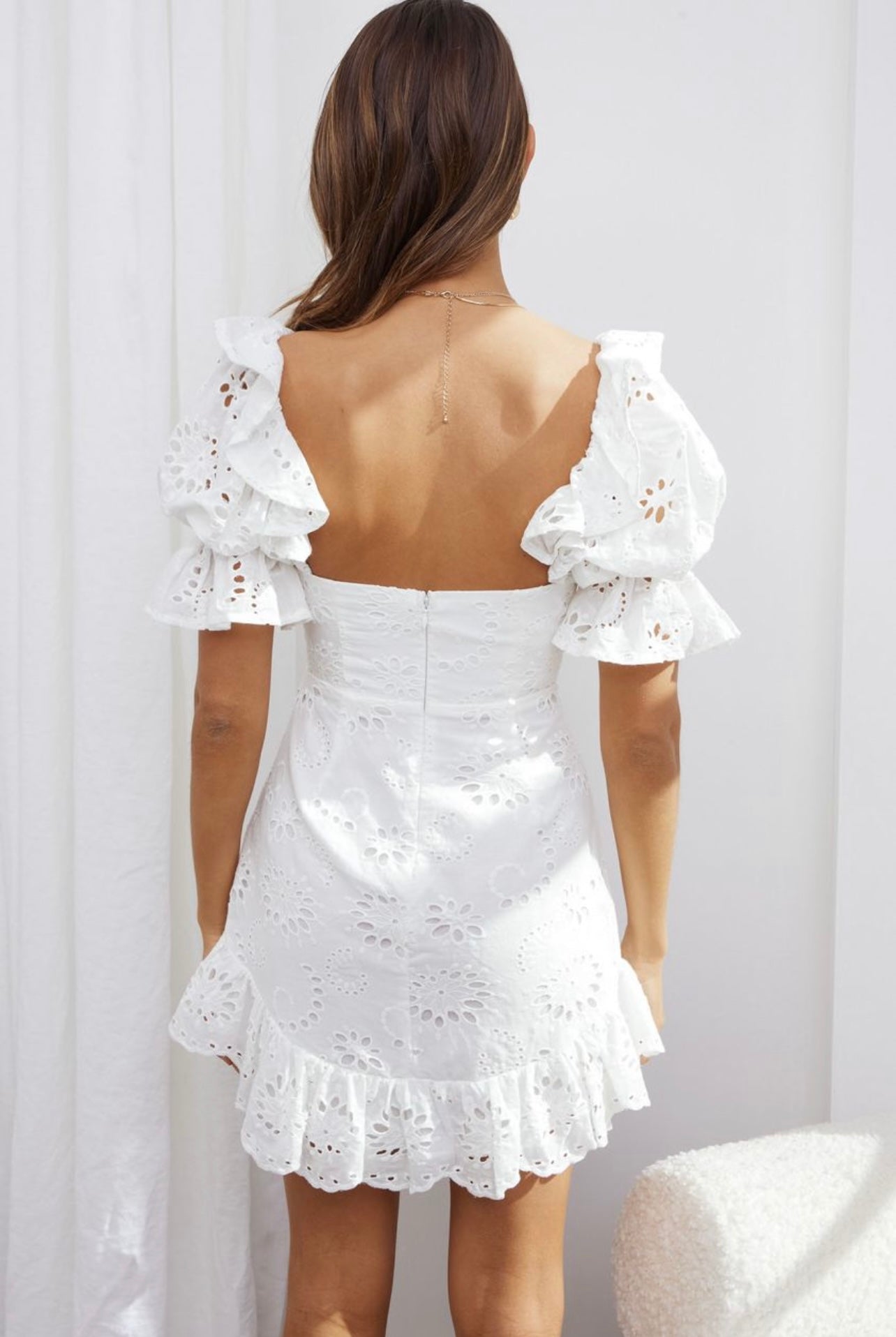 Maryangel Rebel short sleeve ruffled dress in light fabric, featuring a full lace design for early spring style.