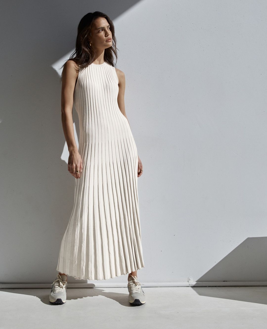 Maryangel Rebel women's knitted maxi dress in stripes with a round neck and fitted waist for a casual summer look.