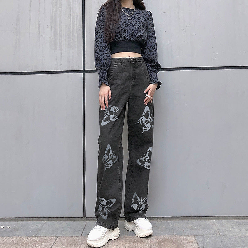 Slimming straight-leg jeans for women with a butterfly print by Maryangel Rebel, featuring a drapey fabric.