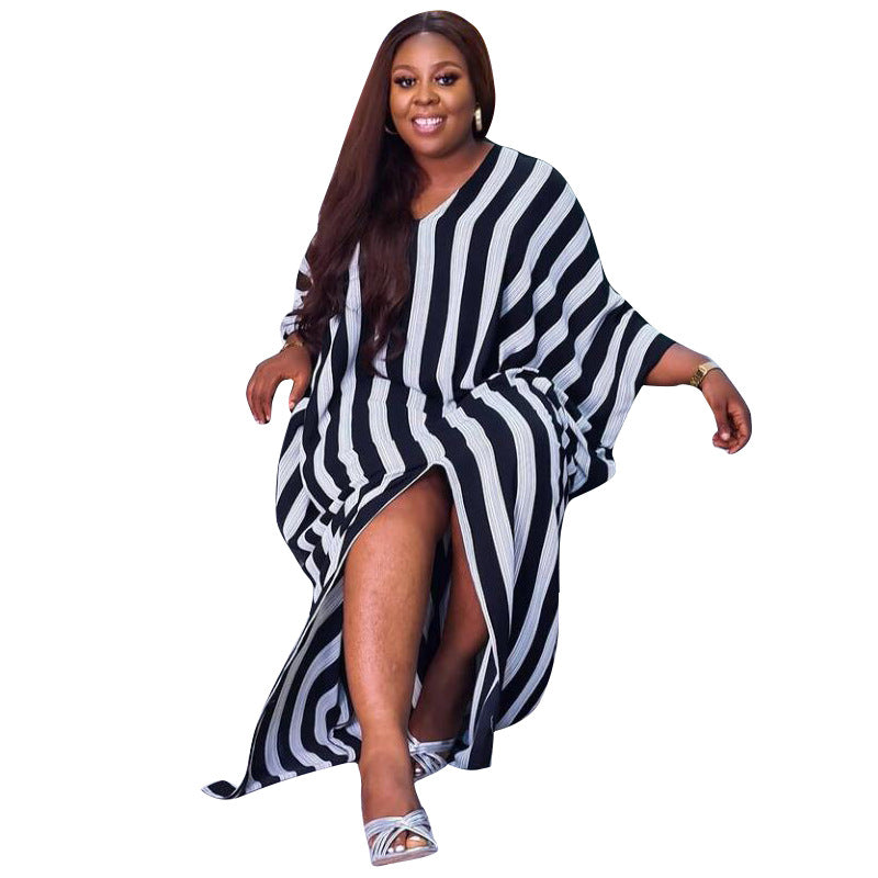 Plus size Maryangel Rebel women's striped asymmetric dress, featuring a loose fit and unique irregular design.