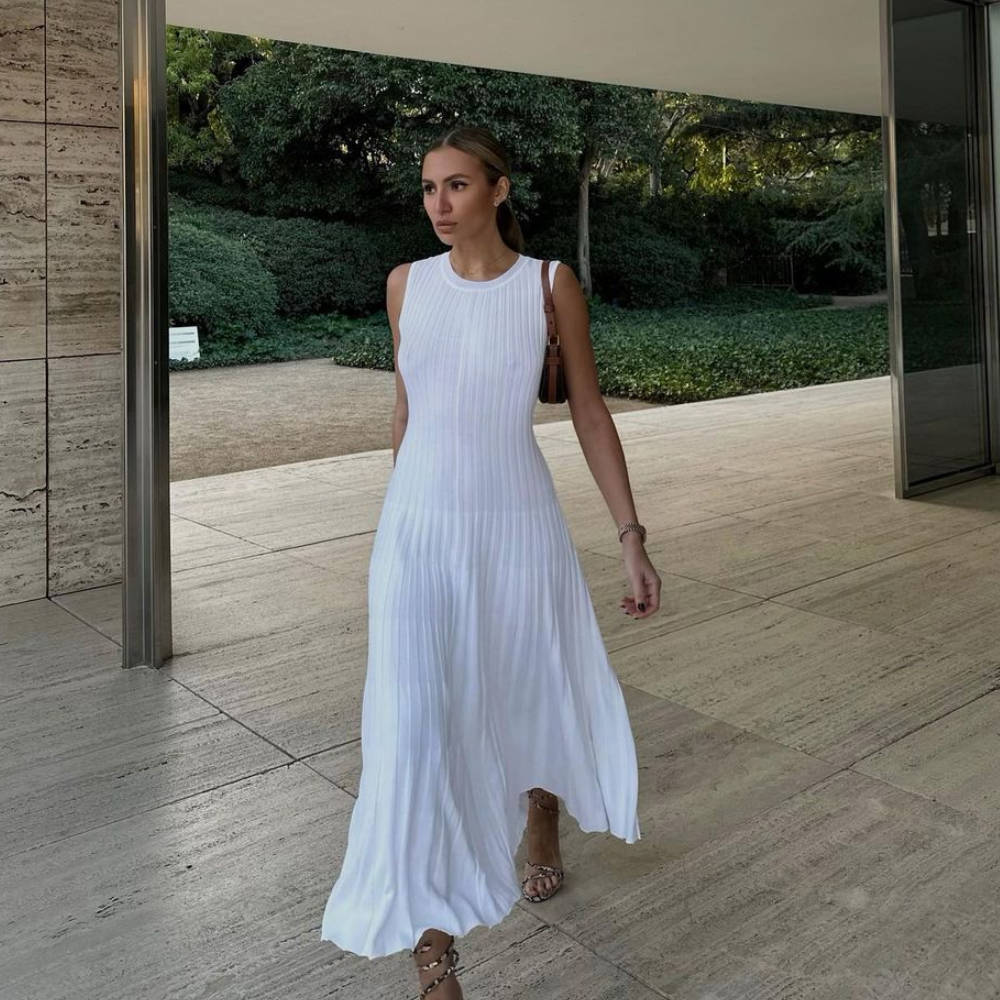 Maryangel Rebel women's knitted maxi dress featuring a round neck, stripe pattern, and a casual waist-tight fit.