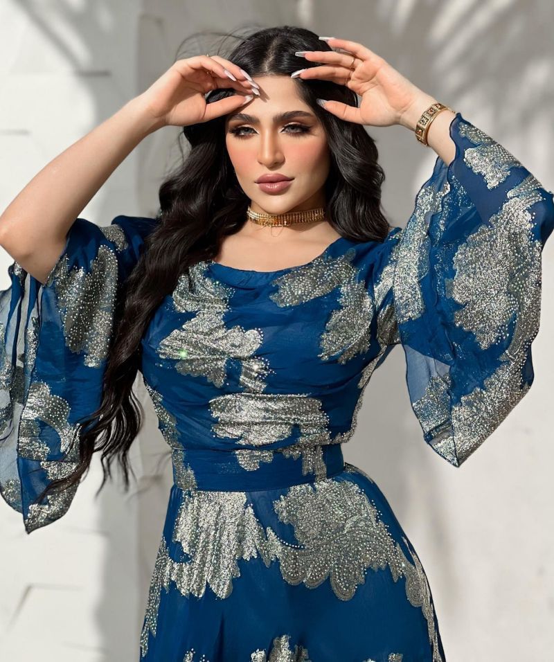 Women’s bronze printed chiffon ball gown dress by Maryangel Rebel, featuring a flowing silhouette and elegant design.