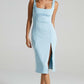 Slim solid color U-neck sleeveless dress by Maryangel Rebel with a high waist design.