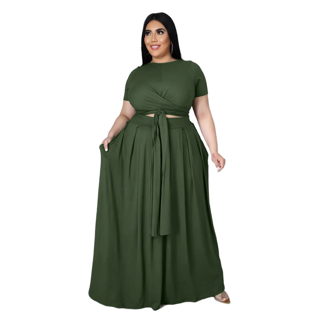 Plus size women’s solid color criss cross lace-up large swing skirt two-piece suit by Maryangel Rebel displayed on a model.