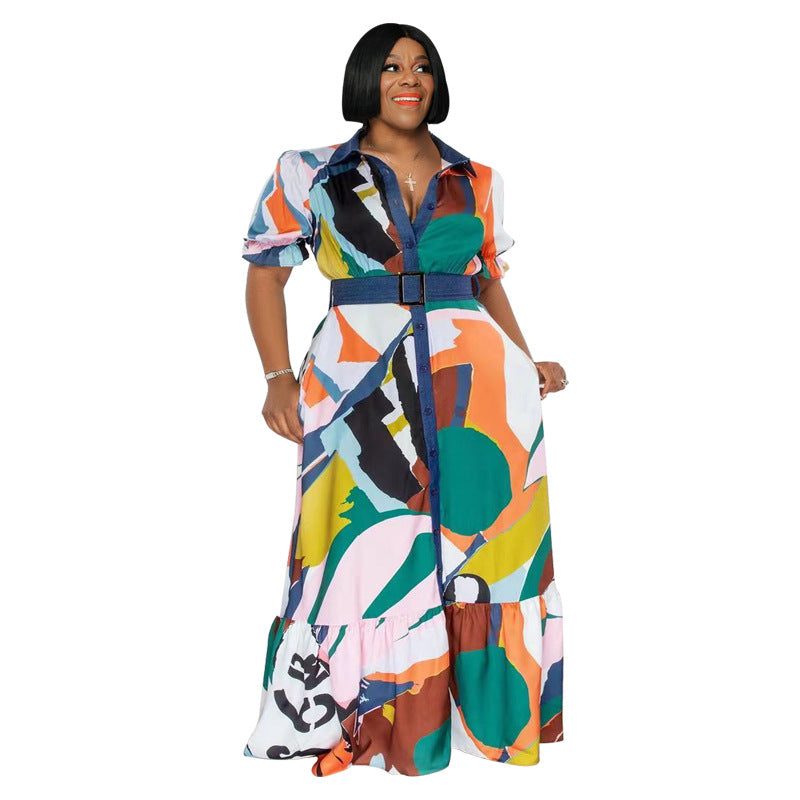 Plus size summer dress by Maryangel Rebel, featuring colorful printing and a belt, designed for a loose, comfortable fit.