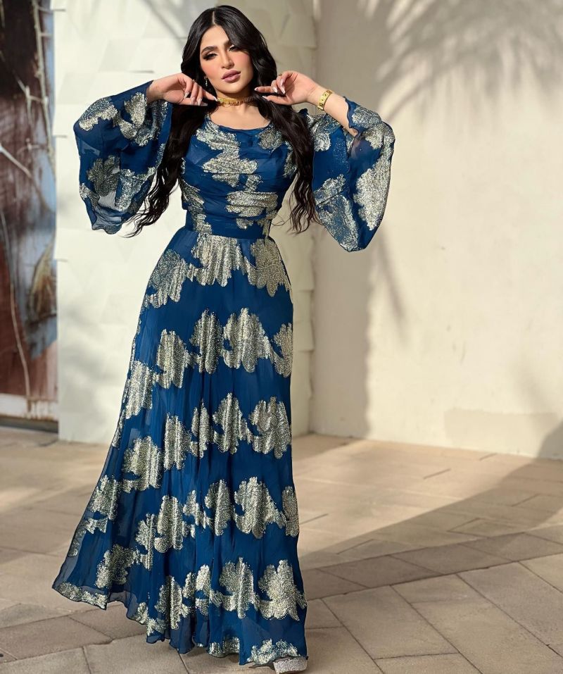 Women’s bronze printed chiffon ball gown dress by Maryangel Rebel, featuring a flowing silhouette and elegant design.