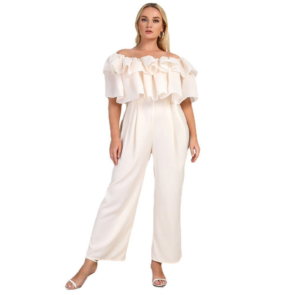 Plus size women's summer jumpsuit by Maryangel Rebel, featuring off-shoulder design and lotus edge detail in solid color.