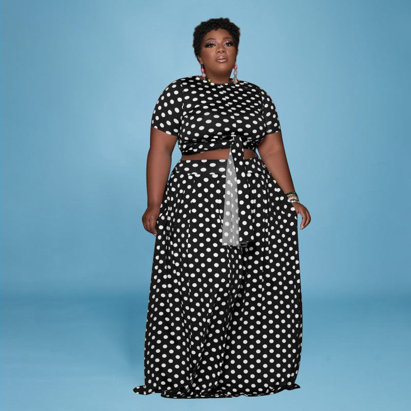 Plus size polka dot two-piece suit by Maryangel Rebel, featuring a casual design with a stylish top and pants.