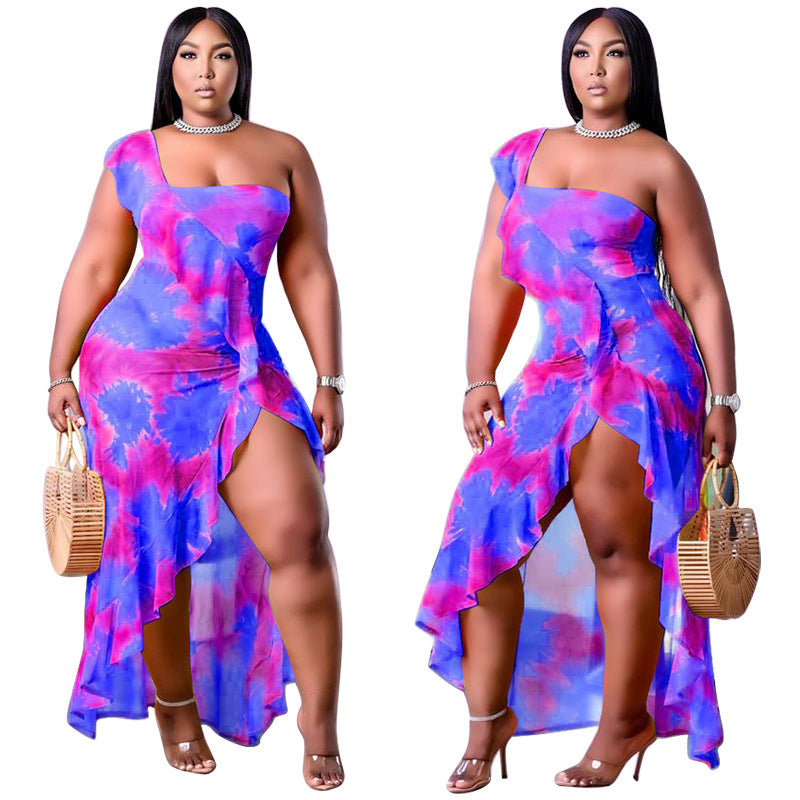 Plus size Maryangel Rebel summer dress featuring a single sleeve and asymmetric flounced skirt with a vibrant print.