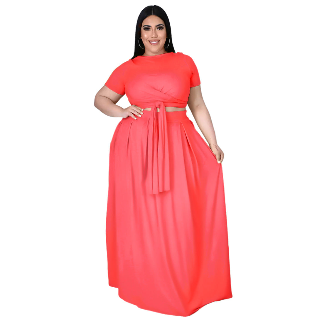 Plus size women’s solid color criss cross lace-up large swing skirt two-piece suit by Maryangel Rebel, displayed on a model.