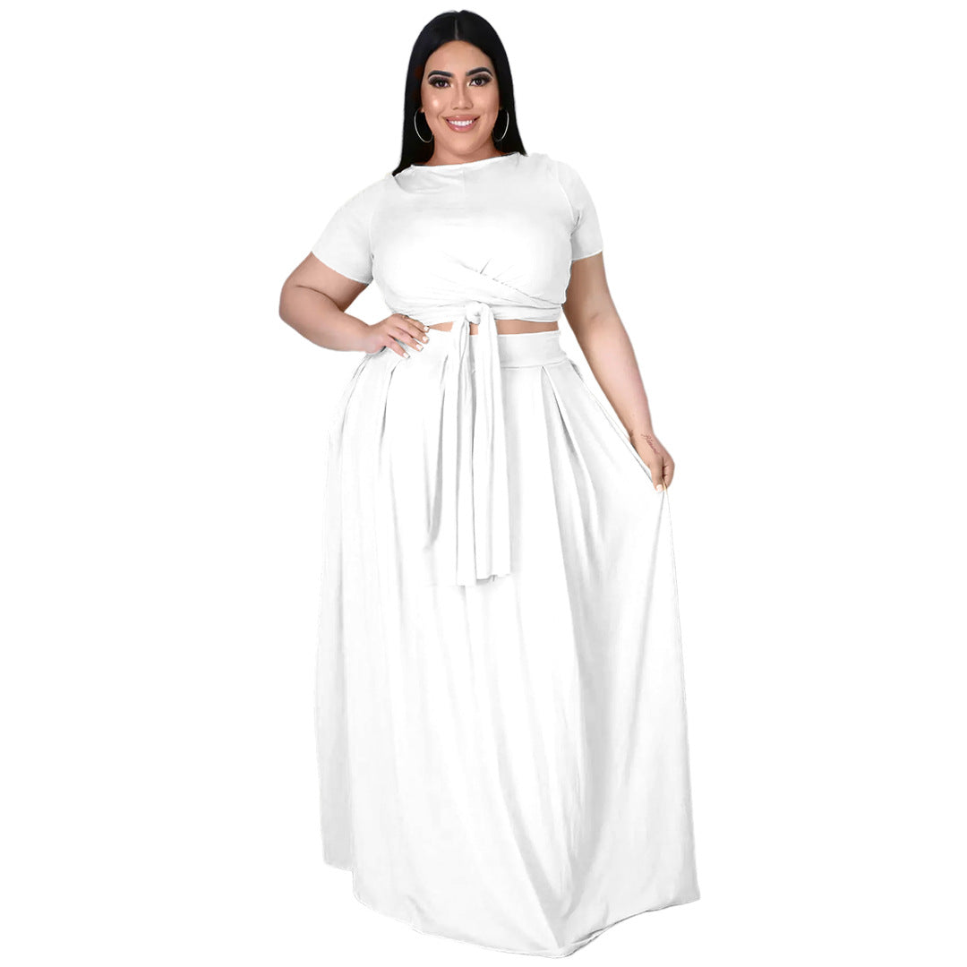 Plus size women's solid color criss cross lace-up swing skirt two-piece suit by Maryangel Rebel, featuring a flowing design.