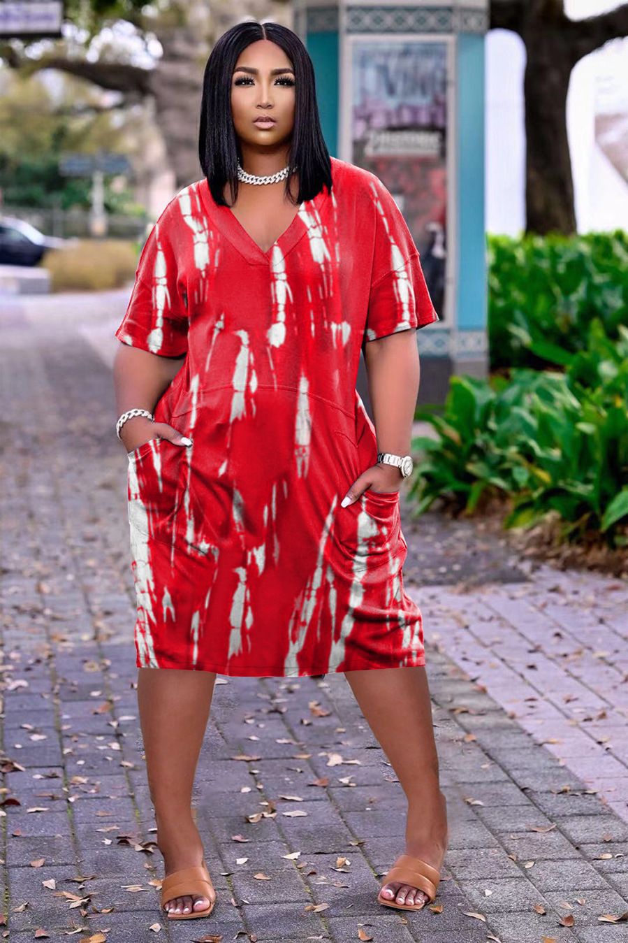 Plus size women's classic printed dress by Maryangel Rebel, featuring a vibrant design and flattering silhouette.