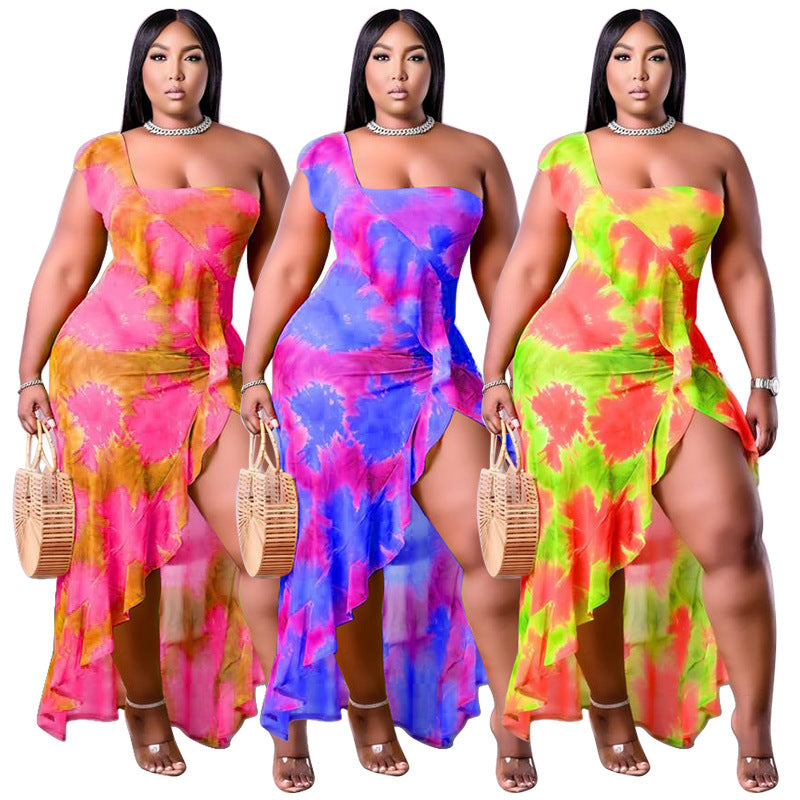 Plus size summer dress by Maryangel Rebel featuring a single sleeve, asymmetric print, and flounced skirt edge.