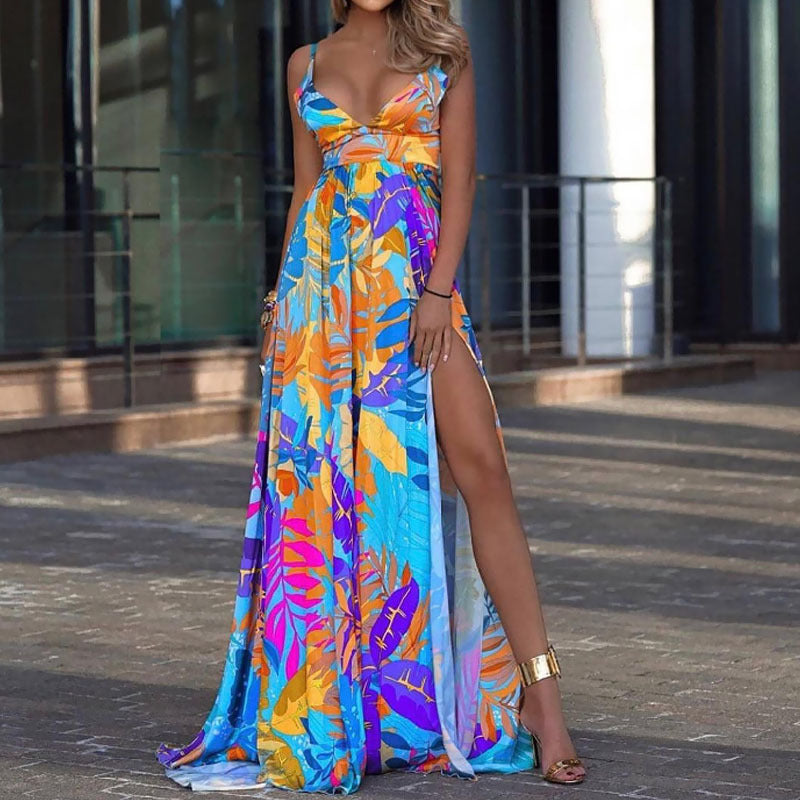 Bohemian off-the-shoulder maxi dress with a leaf print by Maryangel Rebel, featuring a stretchy tube top design.