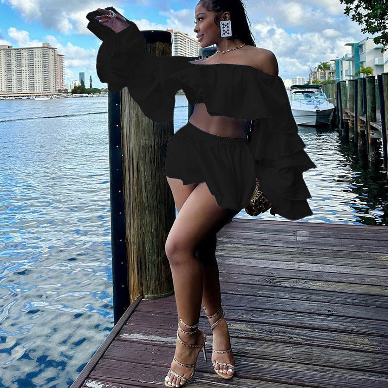 Maryangel Rebel two-piece set featuring a solid color ruffled top and pleated skirt, perfect for spring fashion styles.