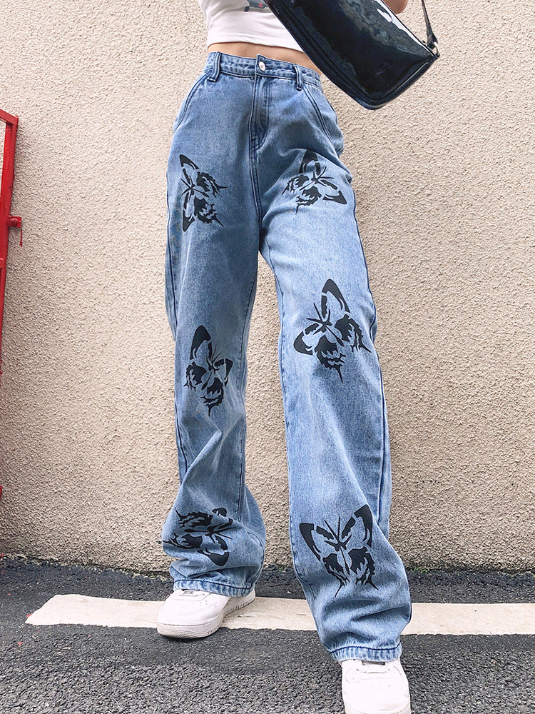 Slimming straight-leg jeans for women with a butterfly print, designed by Maryangel Rebel, showcased in a casual setting.