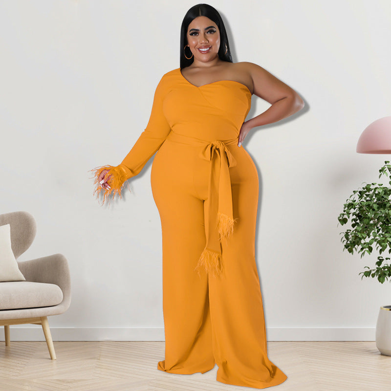 Plus size Maryangel Rebel asymmetric jumpsuit in a stylish design, showcasing vibrant fabric and unique silhouette.