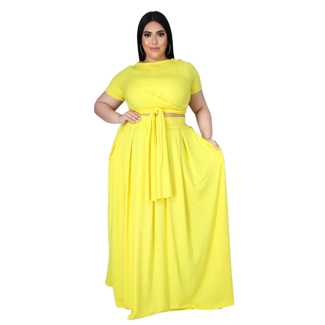 Plus size women’s solid color criss-cross lace-up swing skirt two-piece suit by Maryangel Rebel on a plain background.