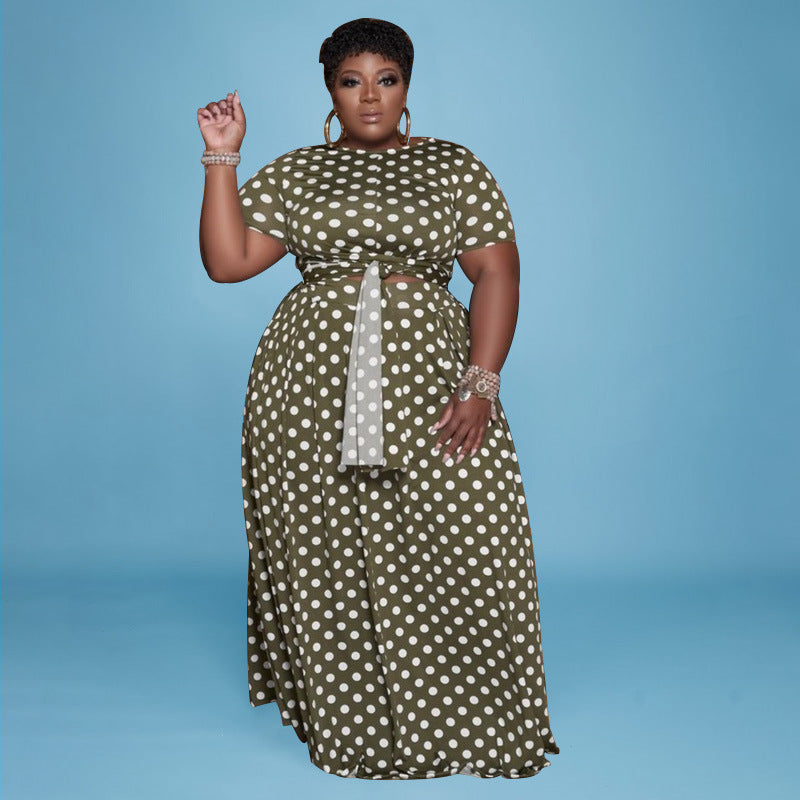 Plus size polka dot two-piece suit for women by Maryangel Rebel, featuring a stylish top and matching bottoms.