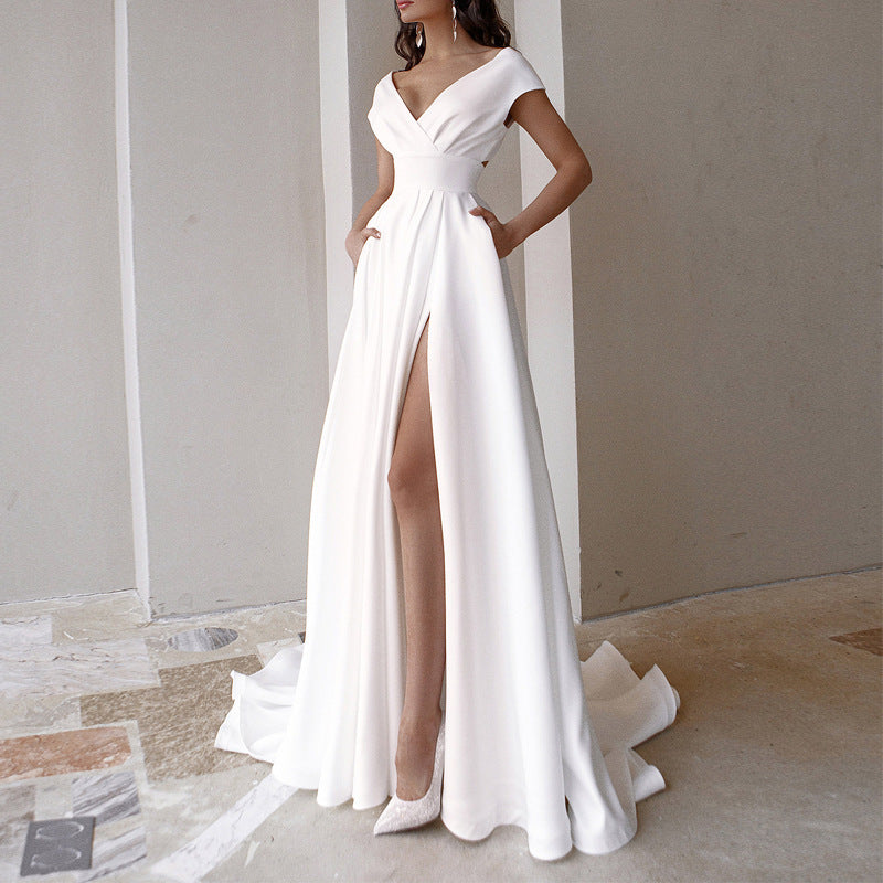 White medium waist maxi dress by Maryangel Rebel with chest wrap and ruffles, perfect for weddings or formal events.