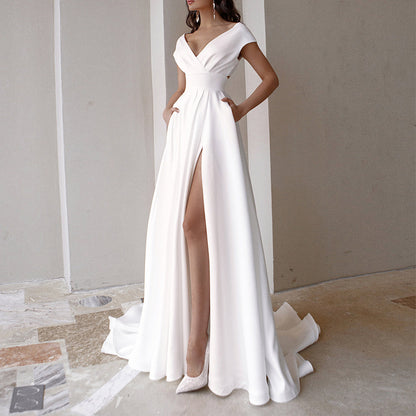 White medium waist maxi dress by Maryangel Rebel with chest wrap and ruffles, perfect for weddings or formal events.